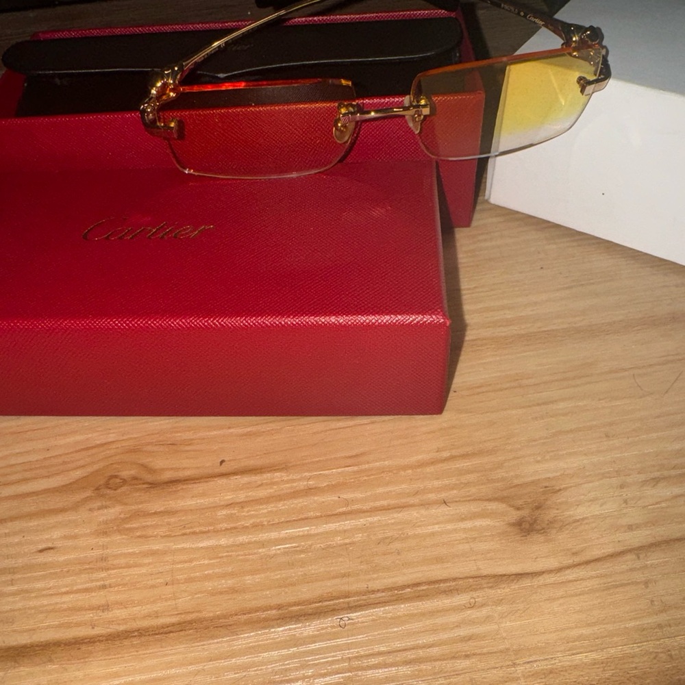 Gold Panther frame Cartier glasses
